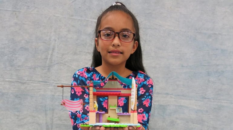 Kidsday reporter Maria Cruz built Mega Construx American Girl Lea's...