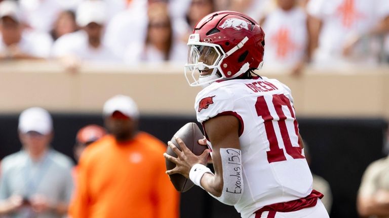 Arkansas quarterback Taylen Green (10) looks to pass in the...