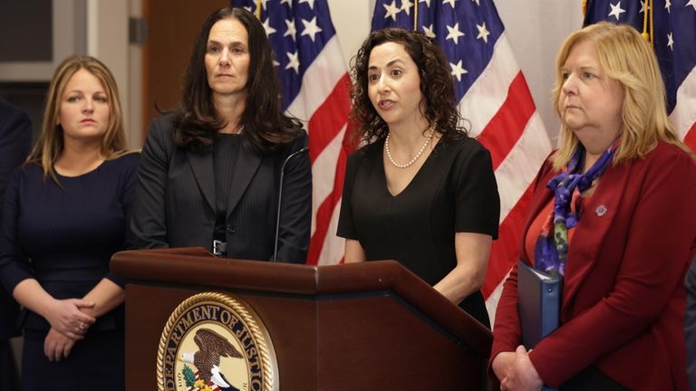 First Assistant U.S. Attorney Carolyn Pokorny at a news conference at...