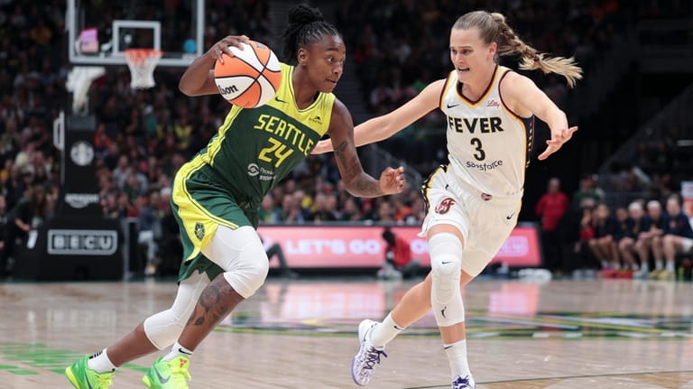 Seattle Storm guard Jewell Loyd (24) drives against Indiana Fever...