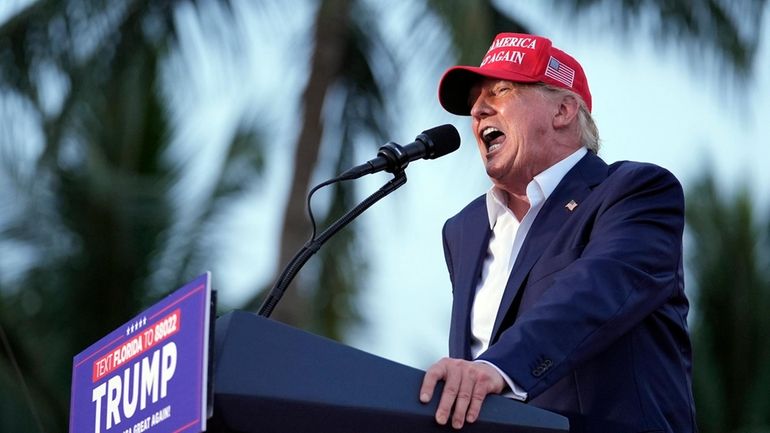 Former President Donald Trump speaks at a campaign rally at...