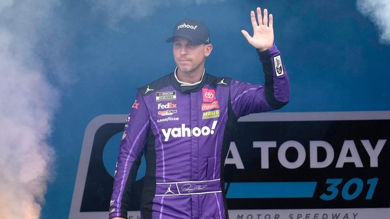 Denny Hamlin is introduced before a NASCAR Cup Series race,...