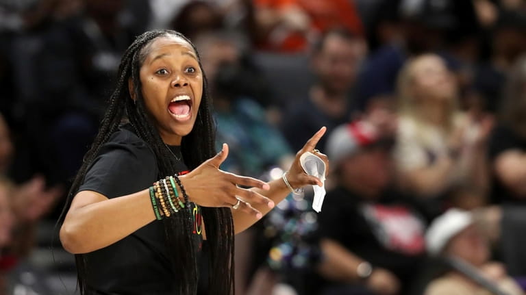 Seattle Storm coach Noelle Quinn calls out to players during...