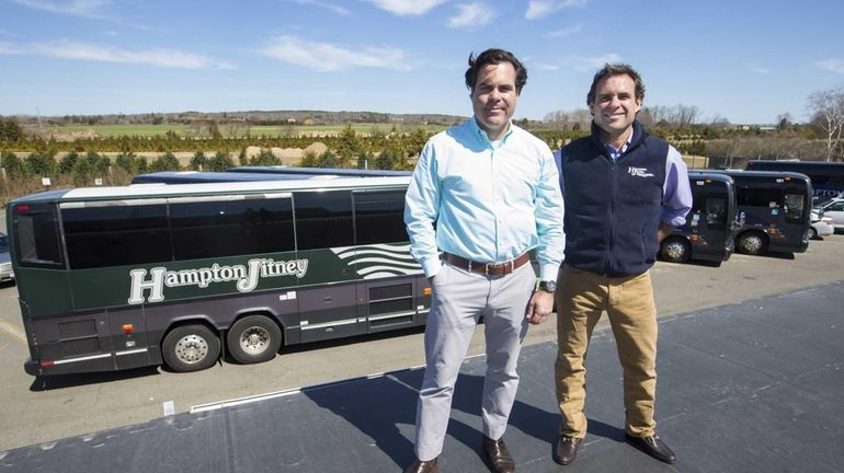 Andrew Lynch, vice president of Hampton Jitney, left, and his...