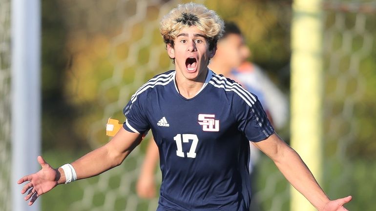 Smithtown West's Gavin Reis (17) after scoring late in the...