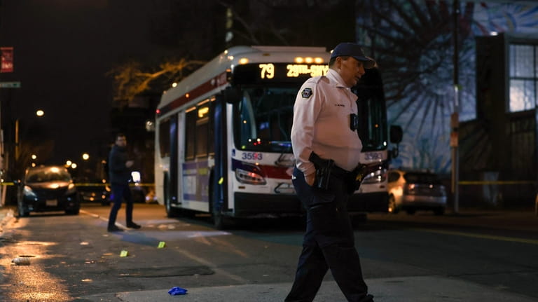 Police respond to a shooting on a SEPTA bus in...