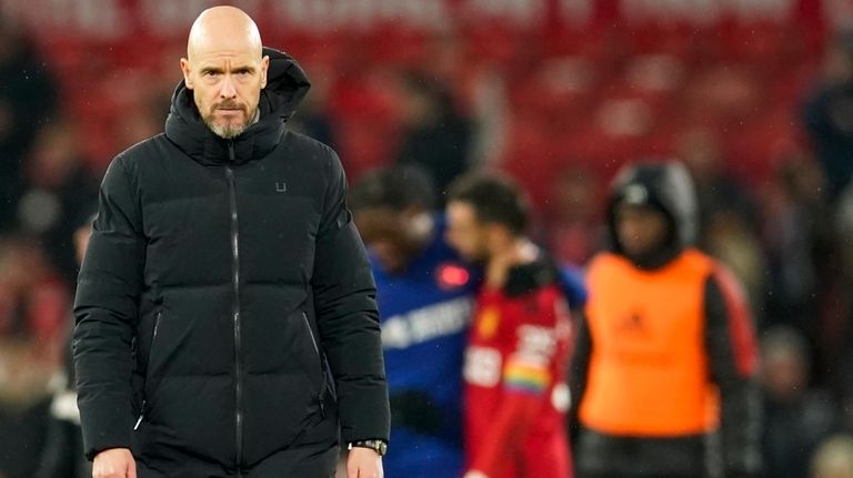 Manchester United's head coach Erik ten Hag leaves the field...