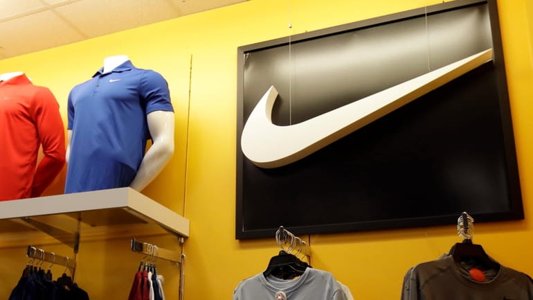 In this Nov. 29, 2019, file photo Nike clothes are...