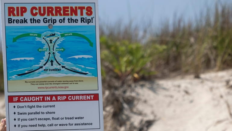 The new rip current warning sign is on display at...