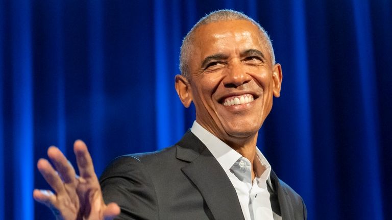 Former President Barack Obama and former first lady Michelle Obama...