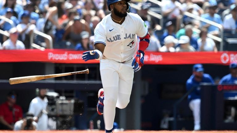 Toronto Blue Jays' Vladimir Guerrero Jr. (27) watches his single...