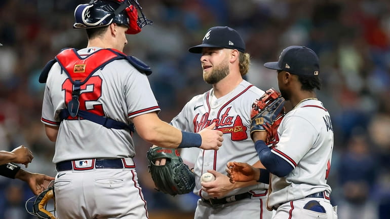 Atlanta Braves' Dylan Lee pitches during the seventh inning of a