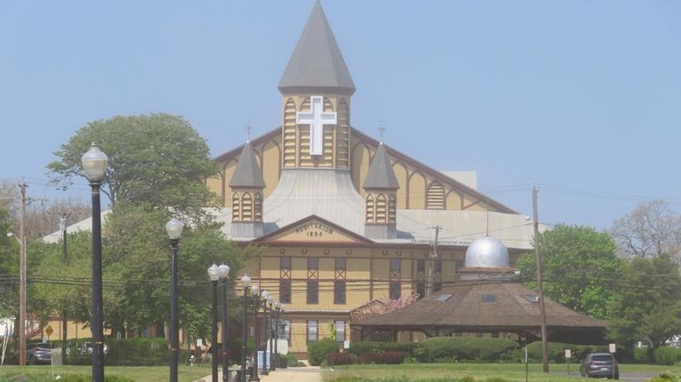 Haze slowly burns away from the Great Auditorium in Ocean...