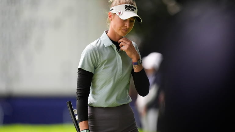 Nelly Korda walks off the green after completing the sixth...