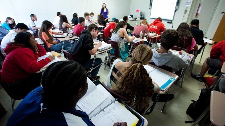 Teachers in Long Island classrooms, such as this one in...