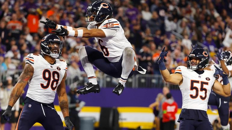 Chicago Bears cornerback Kyler Gordon (6) celebrates with teammates defensive...