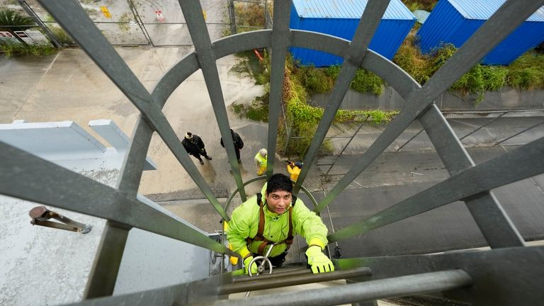 Delwyn Bodden, a worker for the Southeast Louisiana Flood Protection...