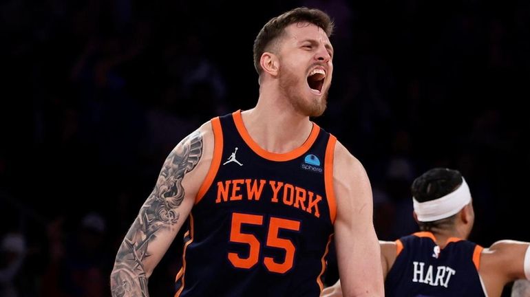 Isaiah Hartenstein of the Knicks reacts during the second half...