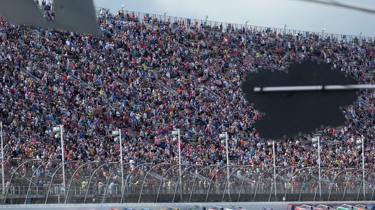 Drivers drive during a NASCAR Cup Series auto race at...