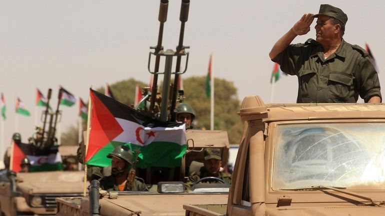 A Polisario Front soldier salutes during a military parade to...