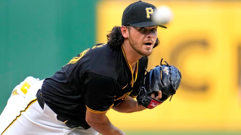 Pittsburgh Pirates starting pitcher Jared Jones delivers during the third...