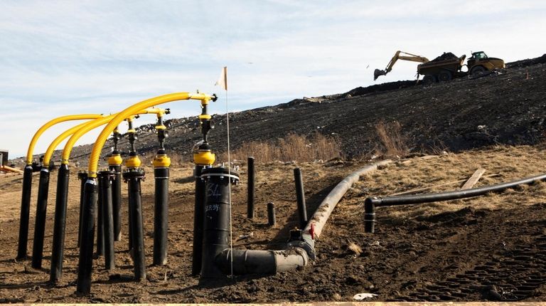 The town has installed hundreds of wells, similar to those shown...