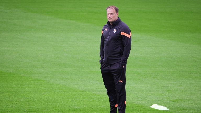 Shakhtar Donetsk's head coach Patrick van Leeuwen attends a training...