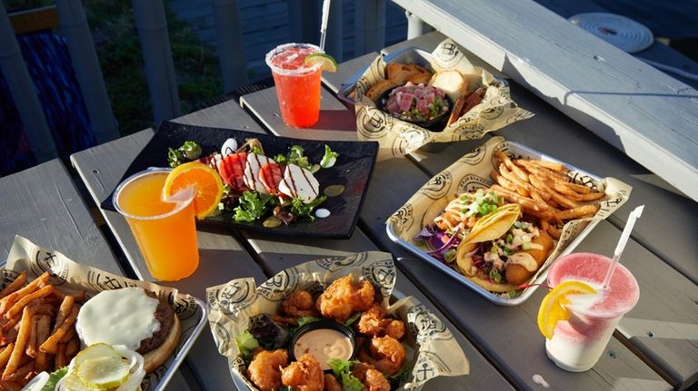 Dig into ceviche, Boathouse burger, salmon skewers, tempura shrimp and...