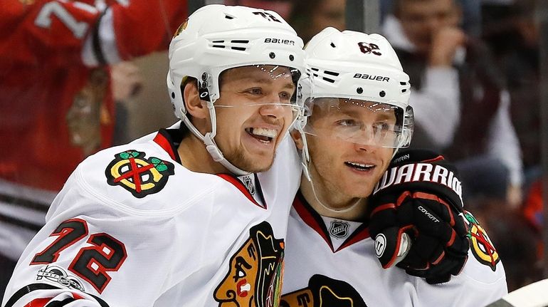 Artemi Panarin, left, and Patrick Kane as teammates in Chicago in...