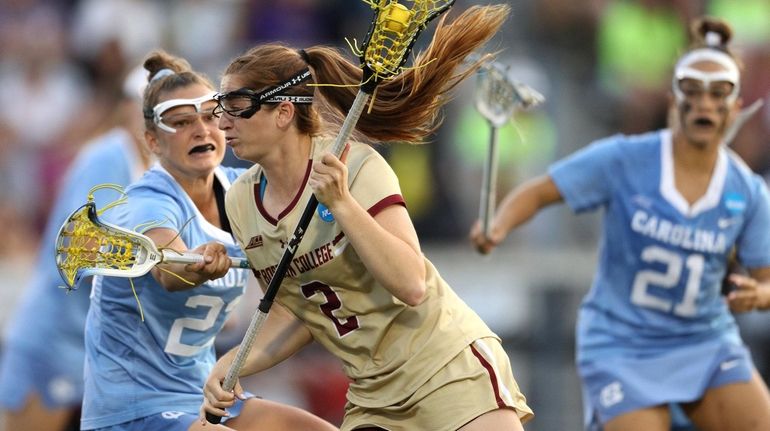 Sam Apuzzo #2 of Boston College Eagles runs toward the...