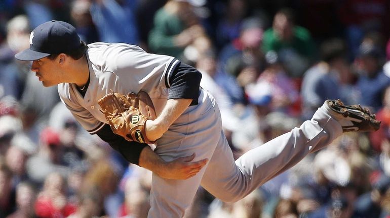 Nathan Eovaldi pitches during the first inning of a baseball...