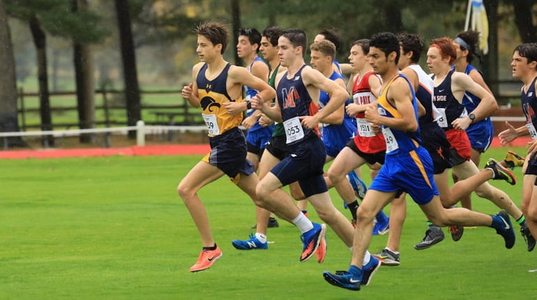 Alex Kasper from Jericho leads at the start of the...