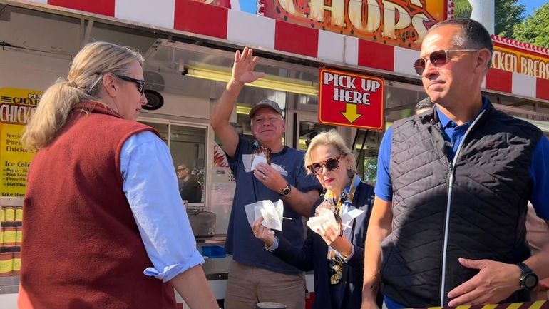 Democratic vice presidential candidate Minnesota Gov. Tim Walz visits the...