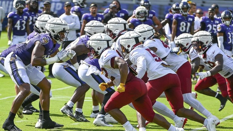 Ravens, Commanders scuffle a bit but give each other high marks after a  joint practice - Newsday