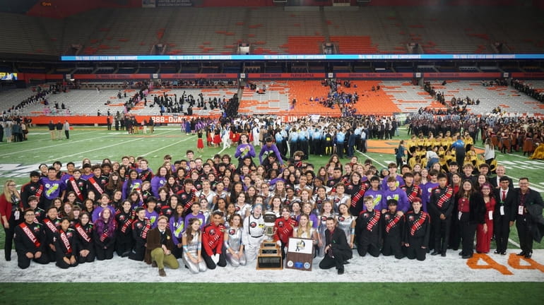 Mineola High School's Mustangs marching band beat out six other...