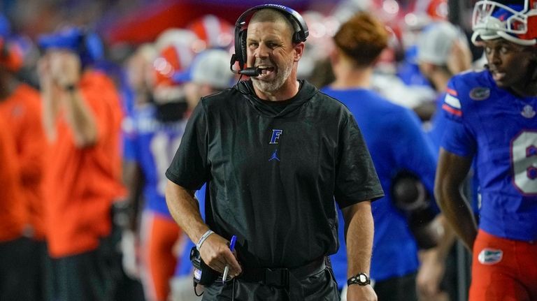 Florida head coach Billy Napier paces the sideline during the...