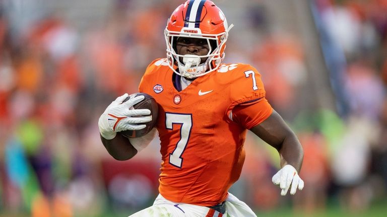 Clemson running back Phil Mafah (7) plays against North Carolina...