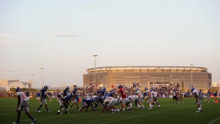 Members of the New York Giants take part in practice...