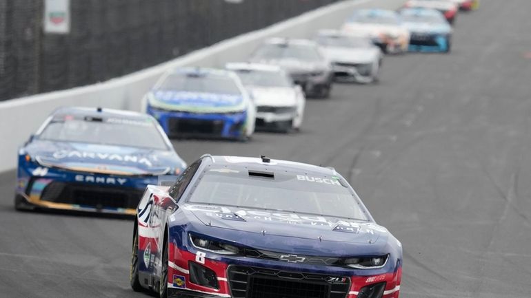 Kyle Busch drives during a NASCAR Cup Series auto race...