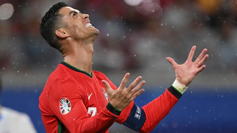 Portugal's Cristiano Ronaldo gestures during a Group F match between...