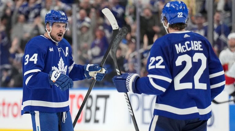 Toronto Maple Leafs center Auston Matthews (34) celebrates his last...