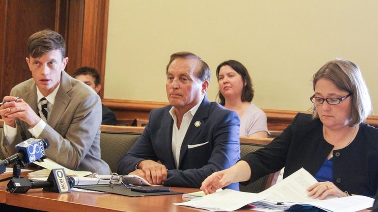 The State Objection Panel, consisting of Iowa Auditor Rob Sand,...