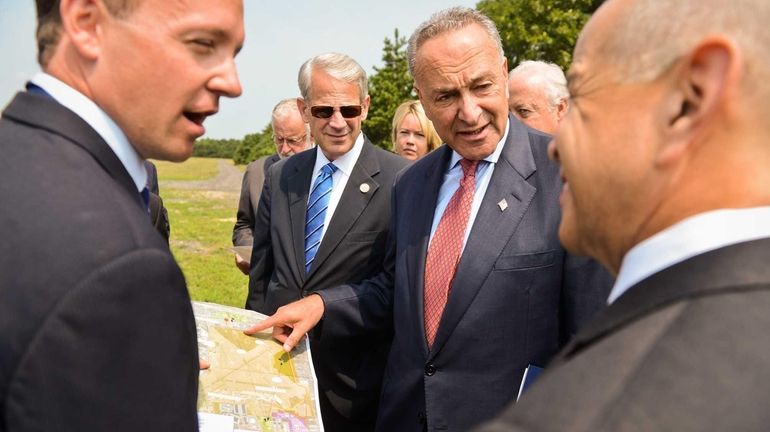 From left, Town of Islip Supervisor Tom Croci, Rep. Steve...