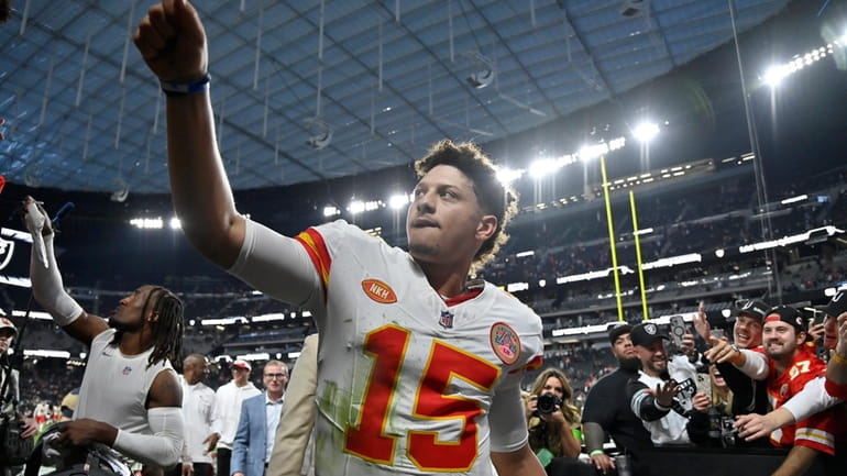 Kansas City Chiefs quarterback Patrick Mahomes (15) celebrates after an...