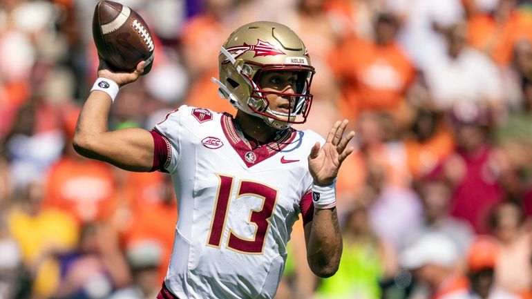 Florida State quarterback Jordan Travis throws a pass during the...