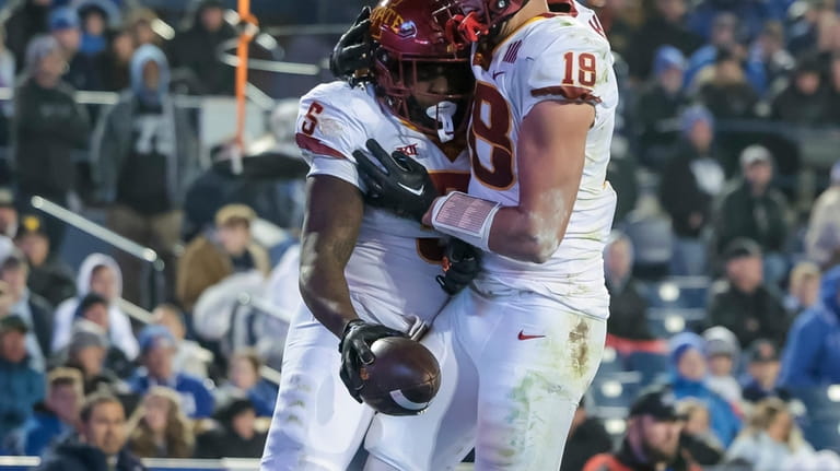 Iowa State running back Cartevious Norton (5) and tight end...