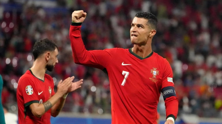 Portugal's Christiano Ronaldo reacts after a Group F match between...
