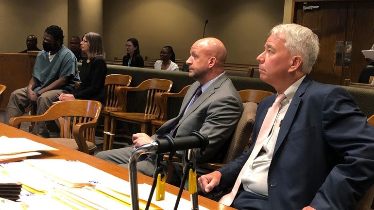 From left, Cleotha Abston, his lawyer Jennifer Case, prosecutor Paul...