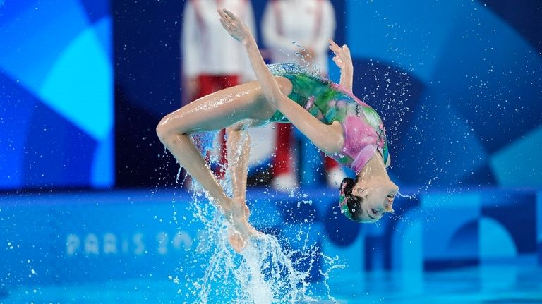 China's Wang Liuyi and Wang Qianyi compete in the duet...