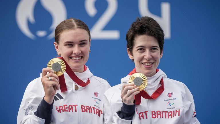 Great Britain's Sophie Unwin, right, and her pilot Jenny Holl...